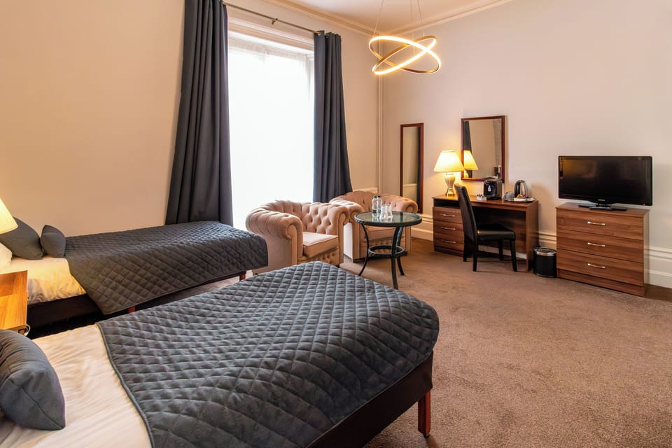 Executive Twin Room | Desk, iron/ironing board, free WiFi, bed sheets