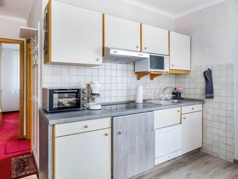 Apartment | Private kitchen | Stovetop, highchair