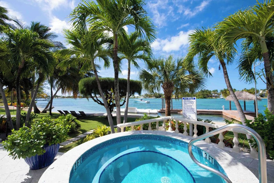 Melt your troubles away in the villa's private seaside hot tub. A floating dock is also provided perfect for jet ski rentals!