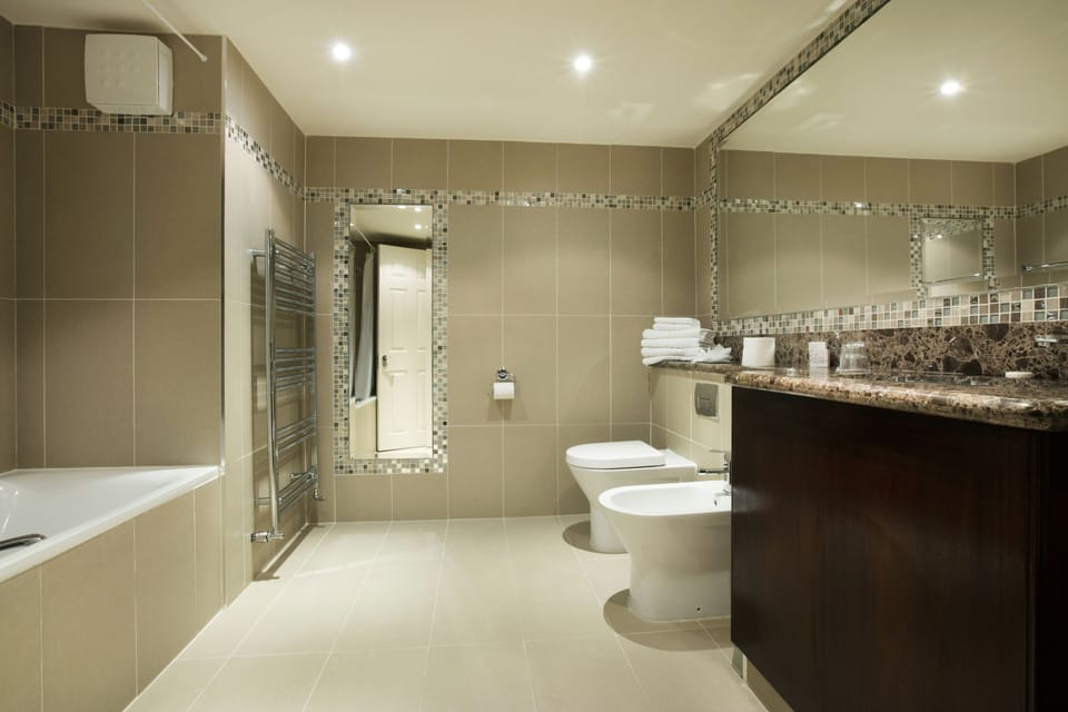 Family Triple Room | Bathroom | Combined shower/tub, free toiletries, hair dryer, towels