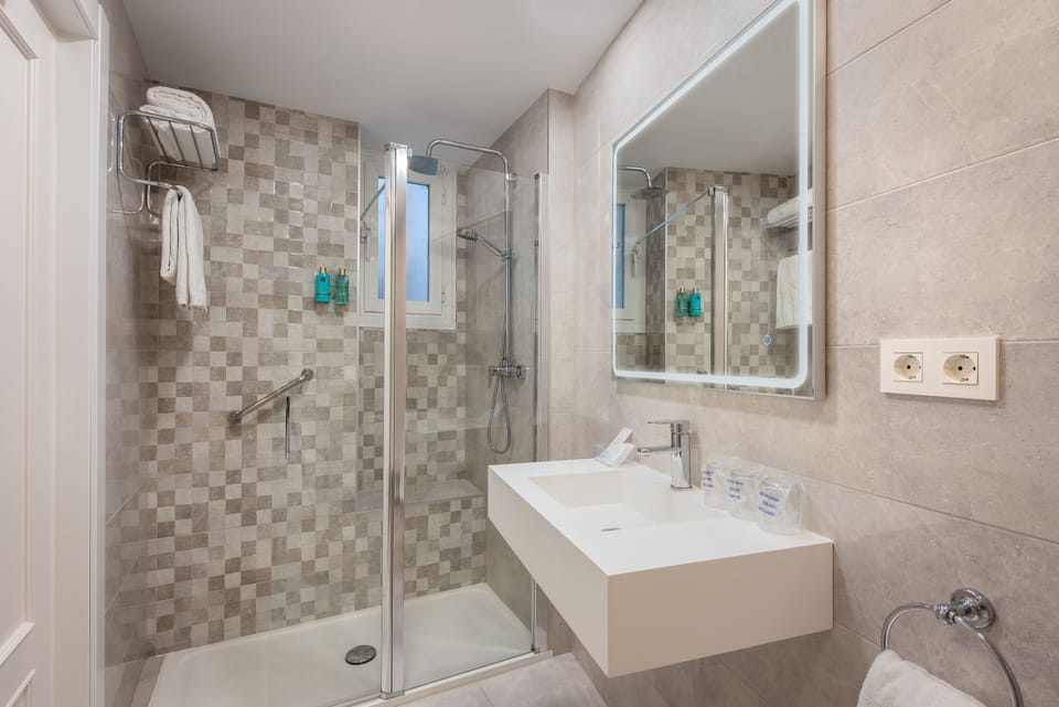 Deep soaking tub, rainfall showerhead, free toiletries, hair dryer