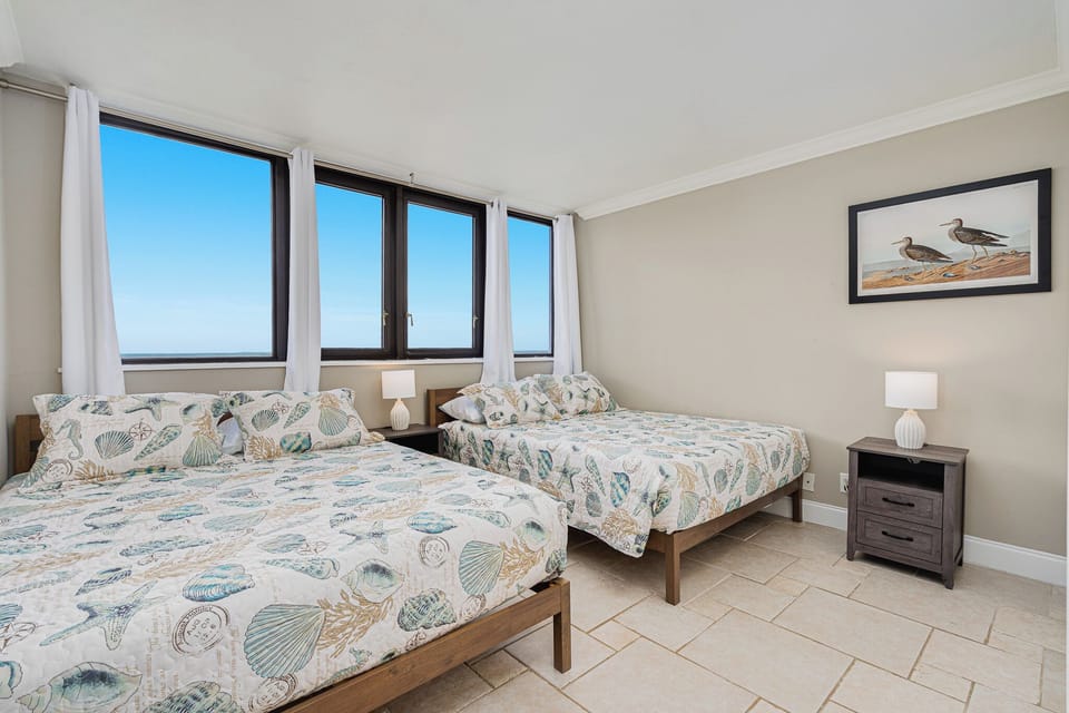 Guest bedroom 2 with two queen beds