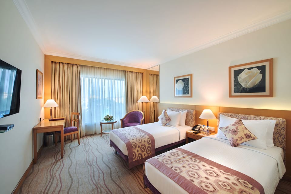 Hypo-allergenic bedding, minibar, in-room safe, desk