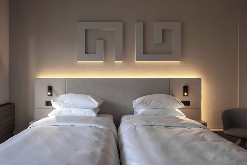 Twin Room | Premium bedding, memory foam beds, in-room safe, desk