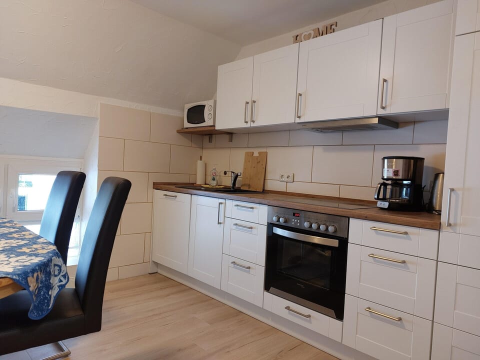 Apartment | Private kitchen | Microwave, stovetop, dishwasher, highchair