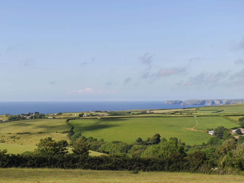 Views to the coast from the grounds | Owl&rsquo;s Roost - Trentinney Farm Holiday Cottages, St Endellion, near Port Isaac