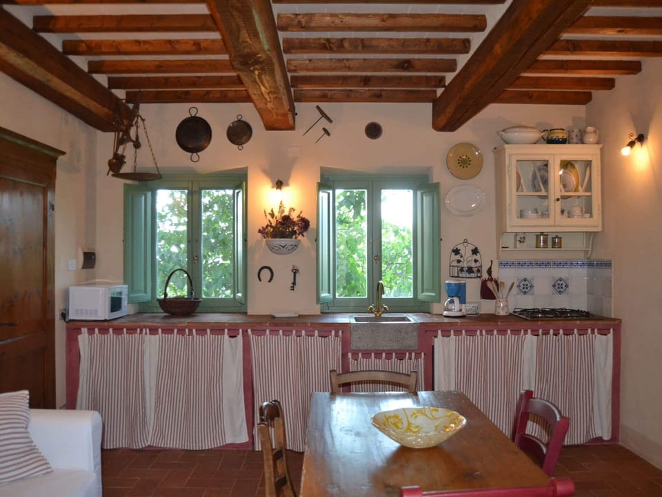 Cottage | Private kitchen | Highchair, cookware/dishes/utensils, dining table
