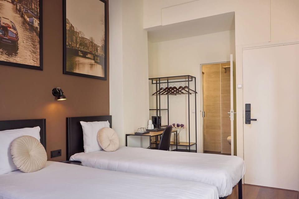 Standard Triple Room, Private Bathroom | Blackout drapes, iron/ironing board, free cribs/infant beds, free WiFi