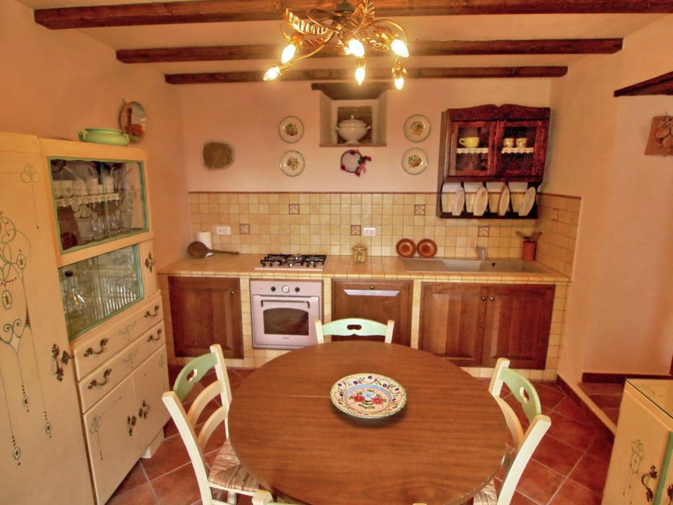 House | Private kitchen | Fridge, highchair, cookware/dishes/utensils, dining tables