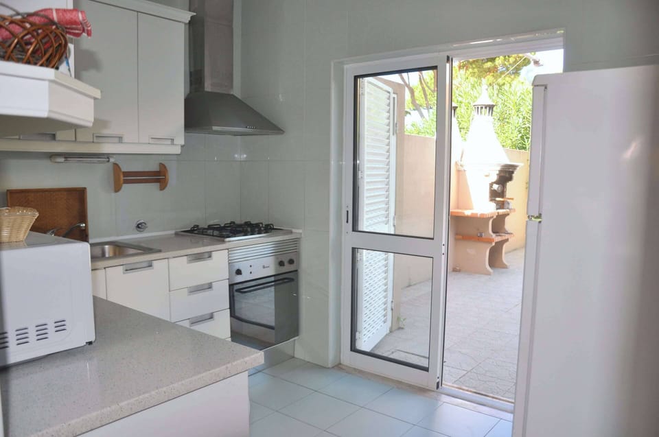 Villa | Private kitchen | Microwave, stovetop, coffee/tea maker, highchair