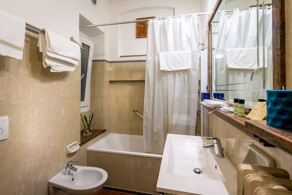 Suite, 2 Bedrooms | Bathroom | Free toiletries, hair dryer, bidet, towels