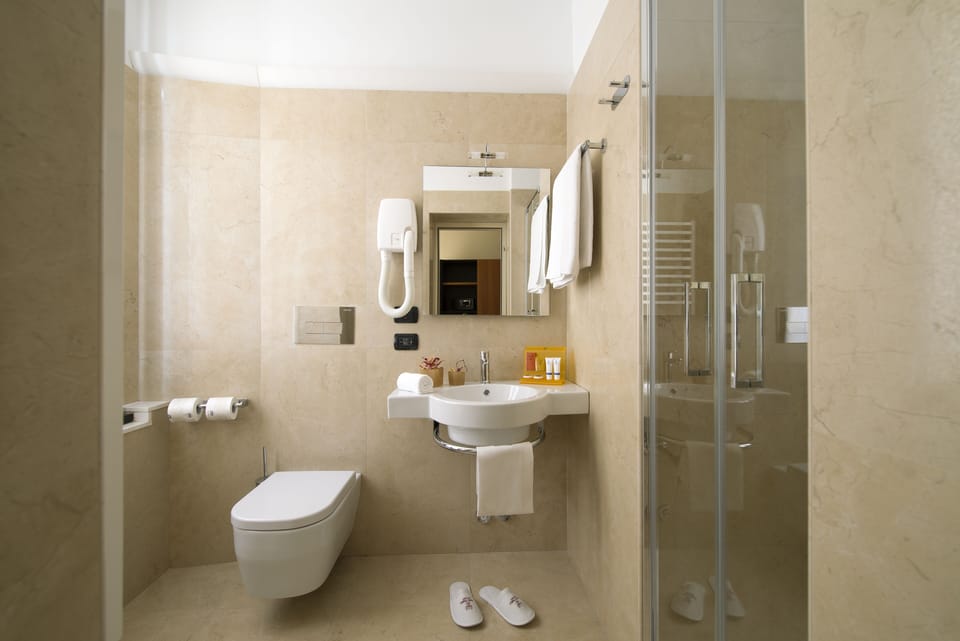 Hair dryer, bidet, towels, soap