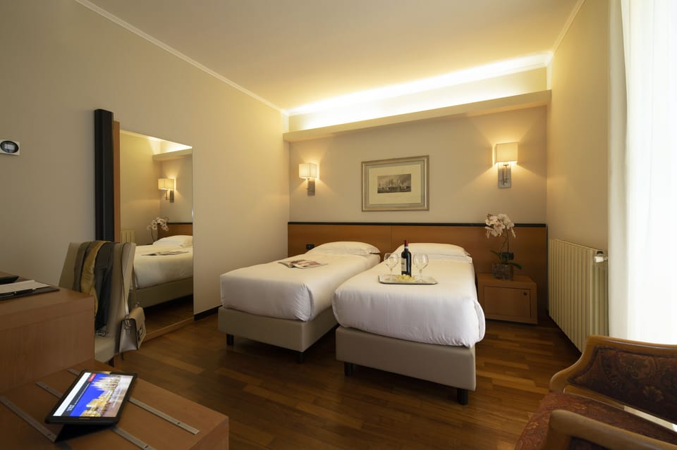 Classic Twin Room | Down comforters, minibar, in-room safe, desk