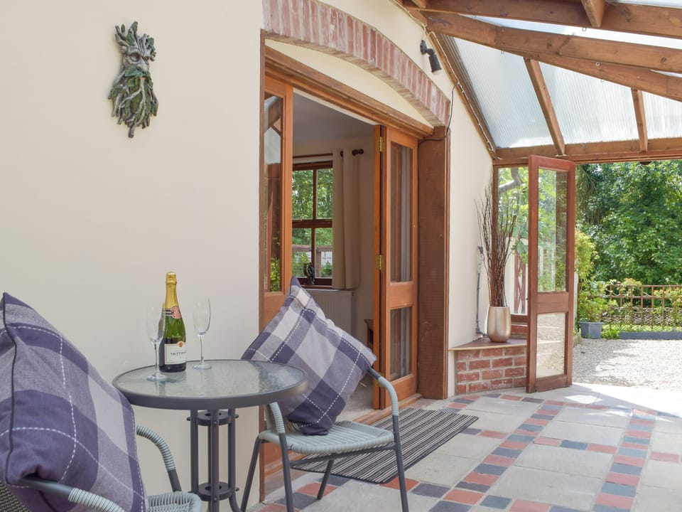 Peaceful sun room | Woodpecker Rest, Llechryd, near Cardigan