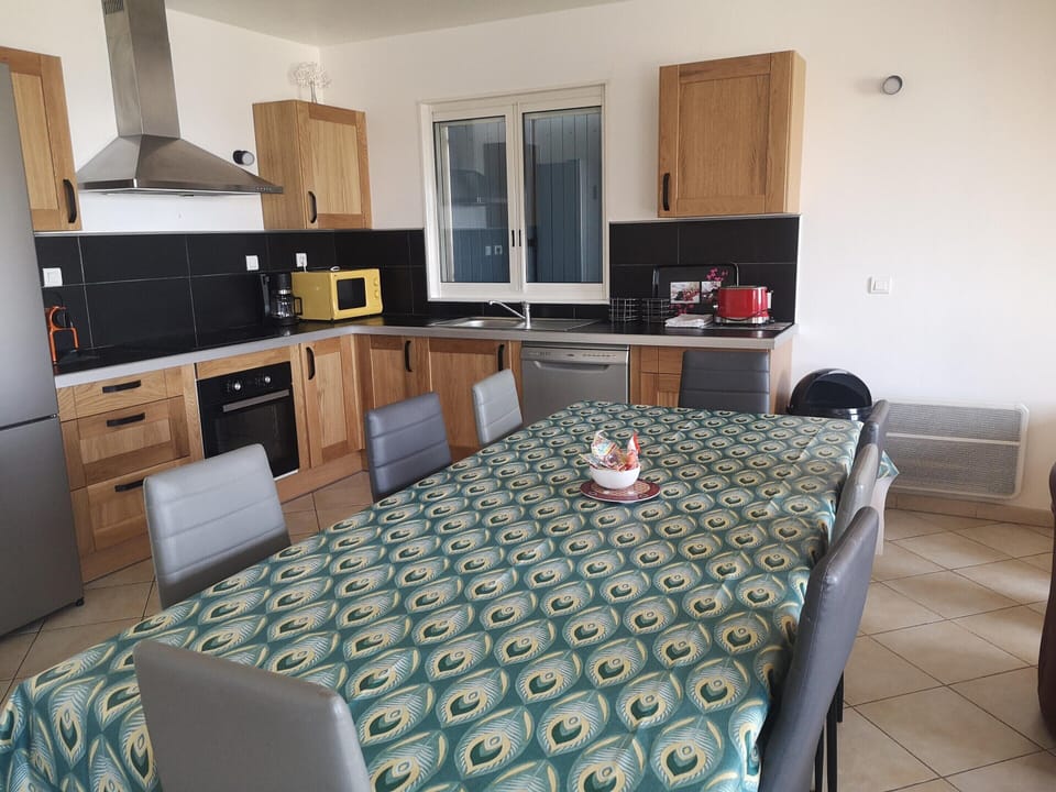 Villa | Private kitchen | Fridge, highchair
