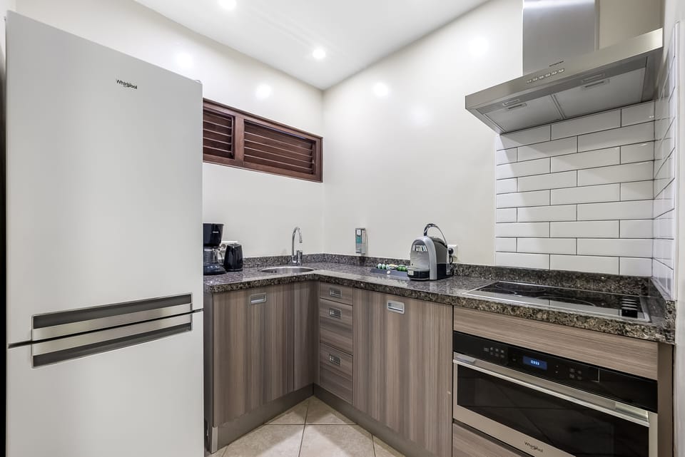 2 Bedroom Apartment Lions | Private kitchen | Espresso maker, electric kettle, highchair