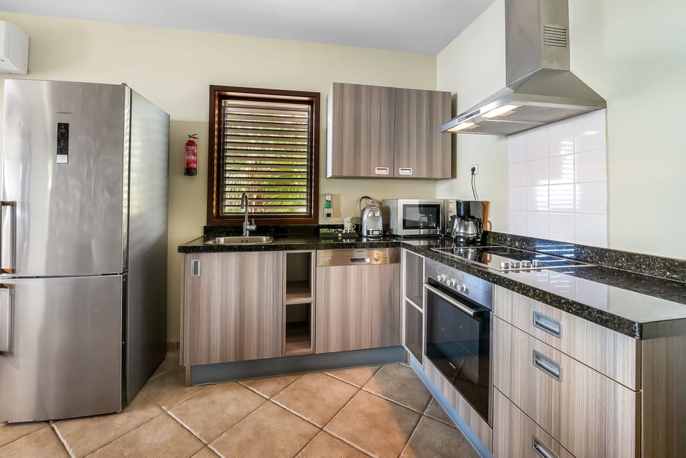 Suite, 2 Bedrooms, Ocean View | Private kitchen | Espresso maker, electric kettle, highchair