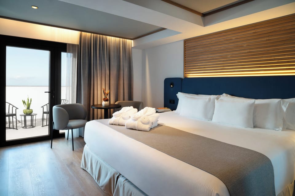 Superior Room, Terrace | Minibar, in-room safe, soundproofing, iron/ironing board