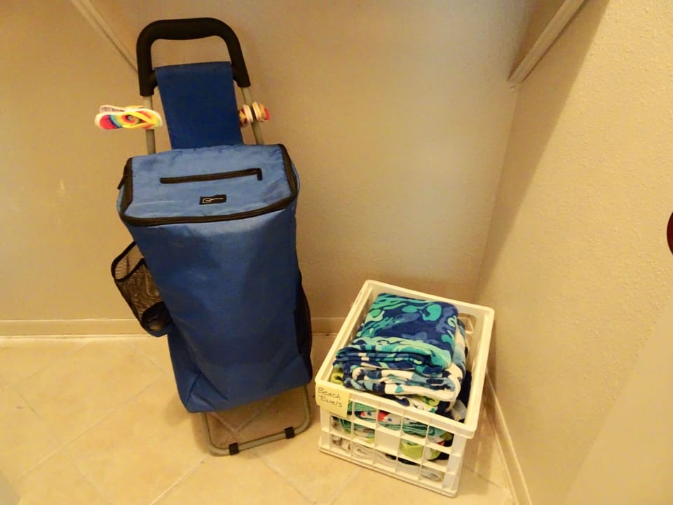 Beach towels and wheeled cart for taking things to beach