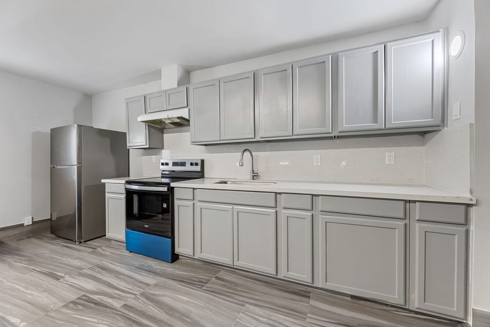 Family Suite, Multiple Beds, Non Smoking | Private kitchen | Full-size fridge, coffee grinder, paper towels, dining tables