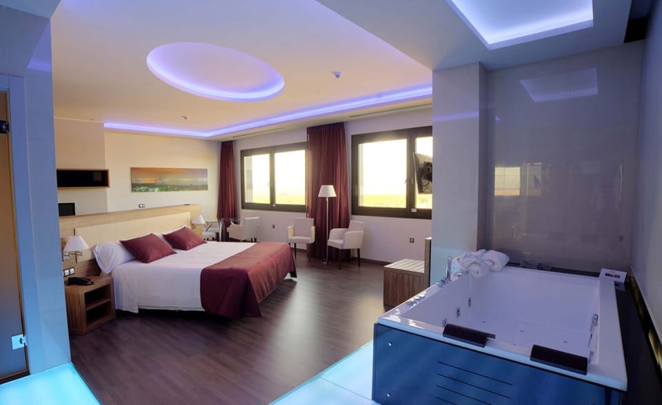 Superior Suite | Memory foam beds, minibar, in-room safe, desk