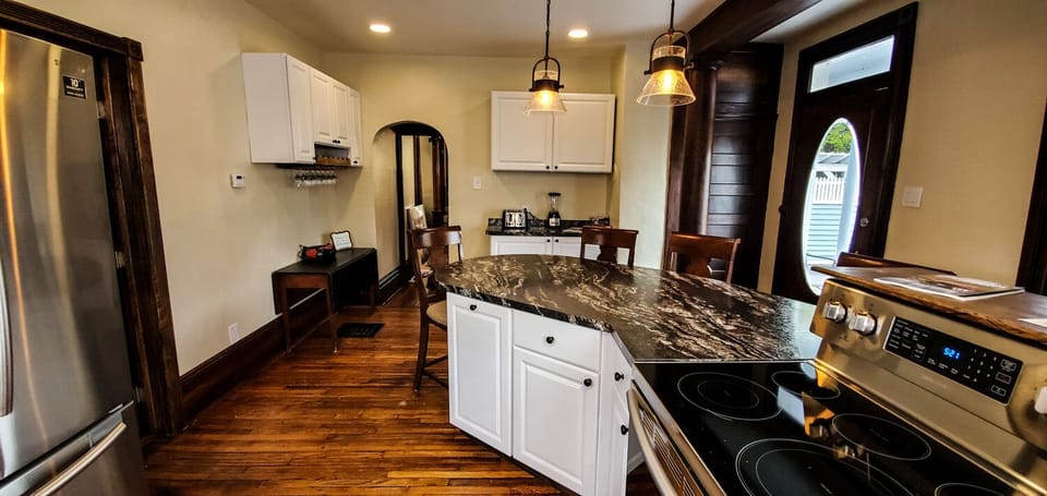 Kitchen Area - Main Level. Kitchen area with kitchen bar and seating for 4.