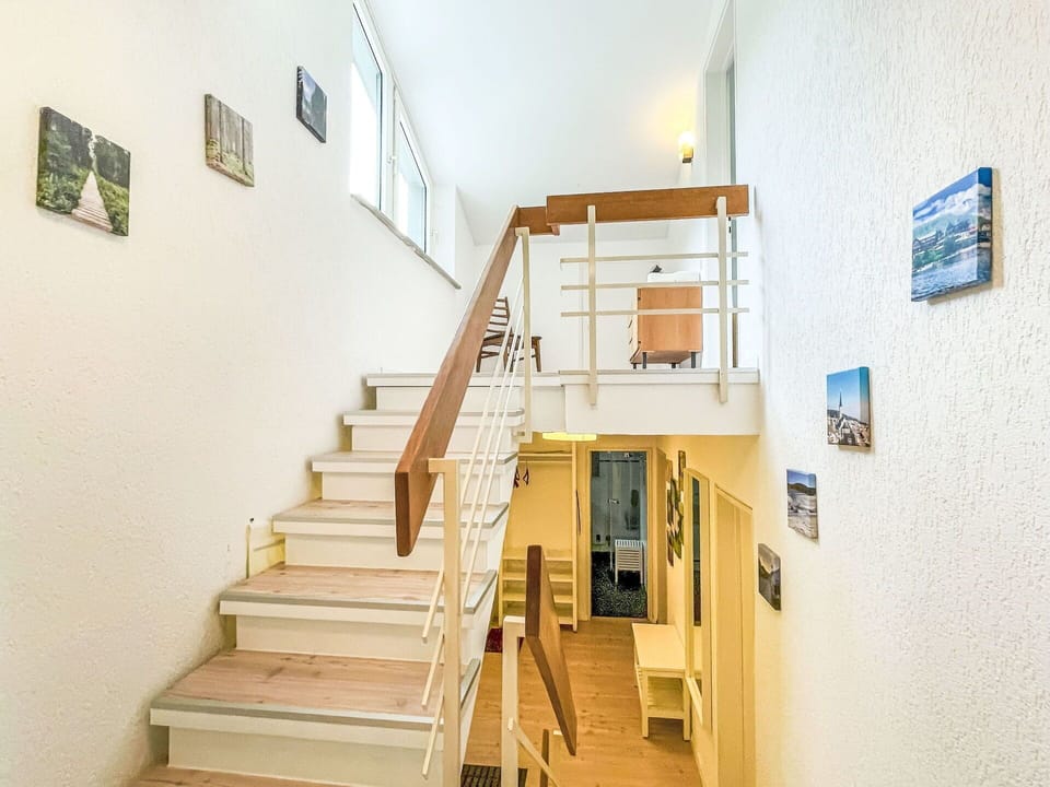 Flooring, Interior Design, Floor, Wood, Ceiling, Stairs, Wood Flooring, Lighting, Room, Door