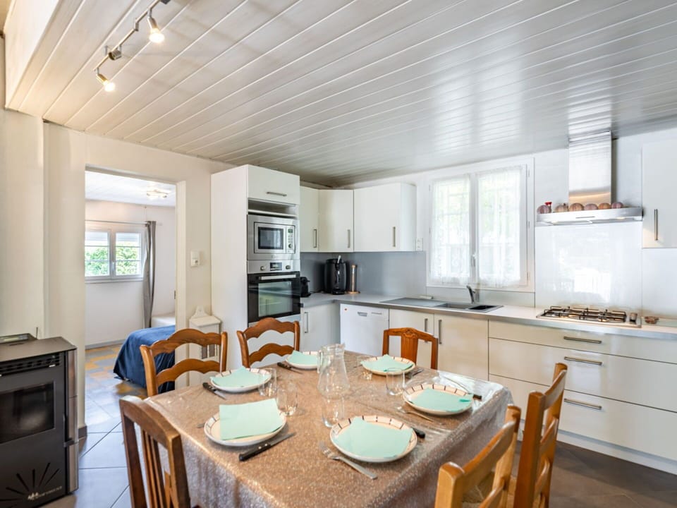Furniture, Table, Cabinetry, Window, Building, Countertop, Wood, Interior Design, Chair, Kitchen