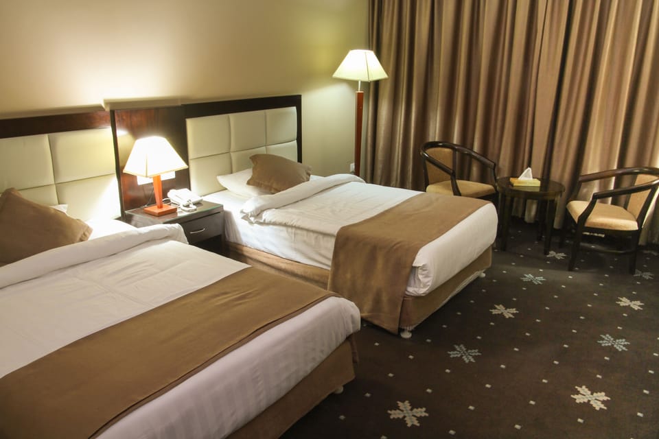 Double or Twin Room | Minibar, in-room safe, free WiFi, bed sheets