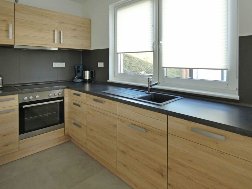 Countertop, Cabinetry, Room, Property, Furniture, Kitchen, Floor, Drawer, Building, Sink