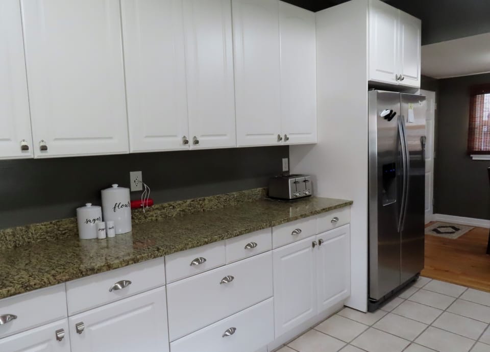 Ample counter space and fridge with ice and water in the door