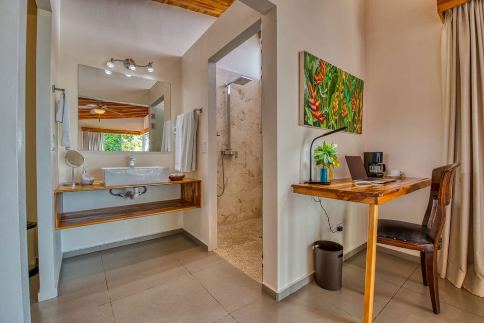 Luxury Suite, 1 King Bed with Sofa bed, Ocean View | Bathroom | Shower, rainfall showerhead, free toiletries, hair dryer