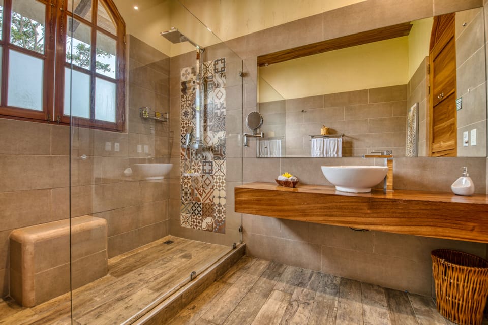 Suite, 1 King Bed, Ocean View | Bathroom | Shower, rainfall showerhead, free toiletries, hair dryer