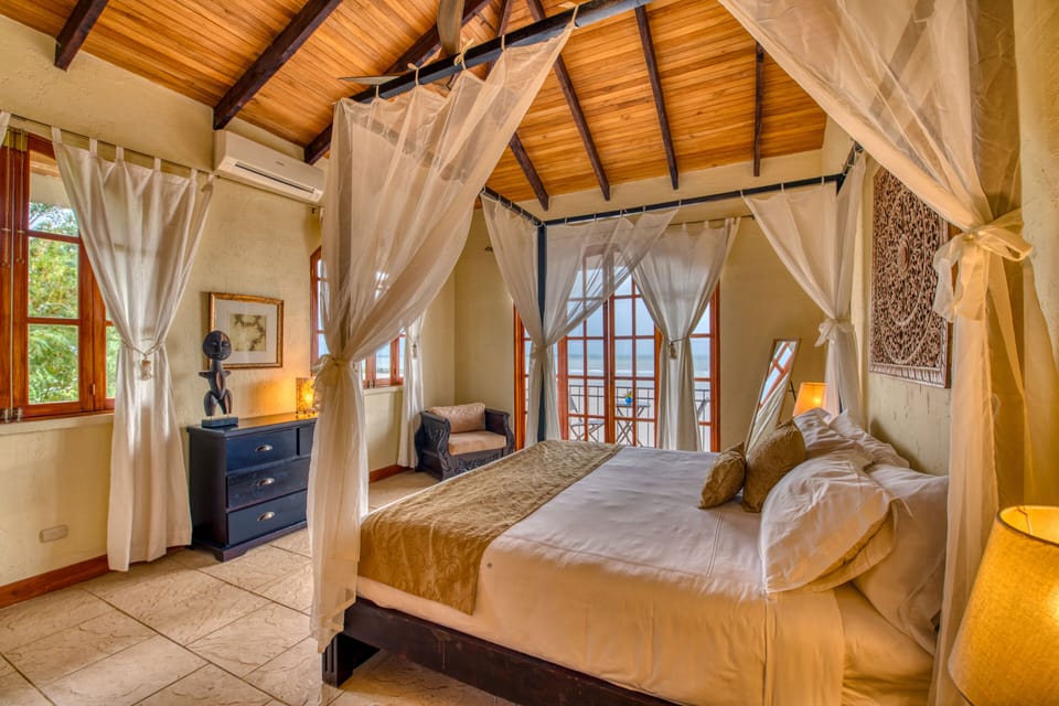Suite, 1 King Bed, Ocean View | In-room safe, desk, free WiFi, bed sheets