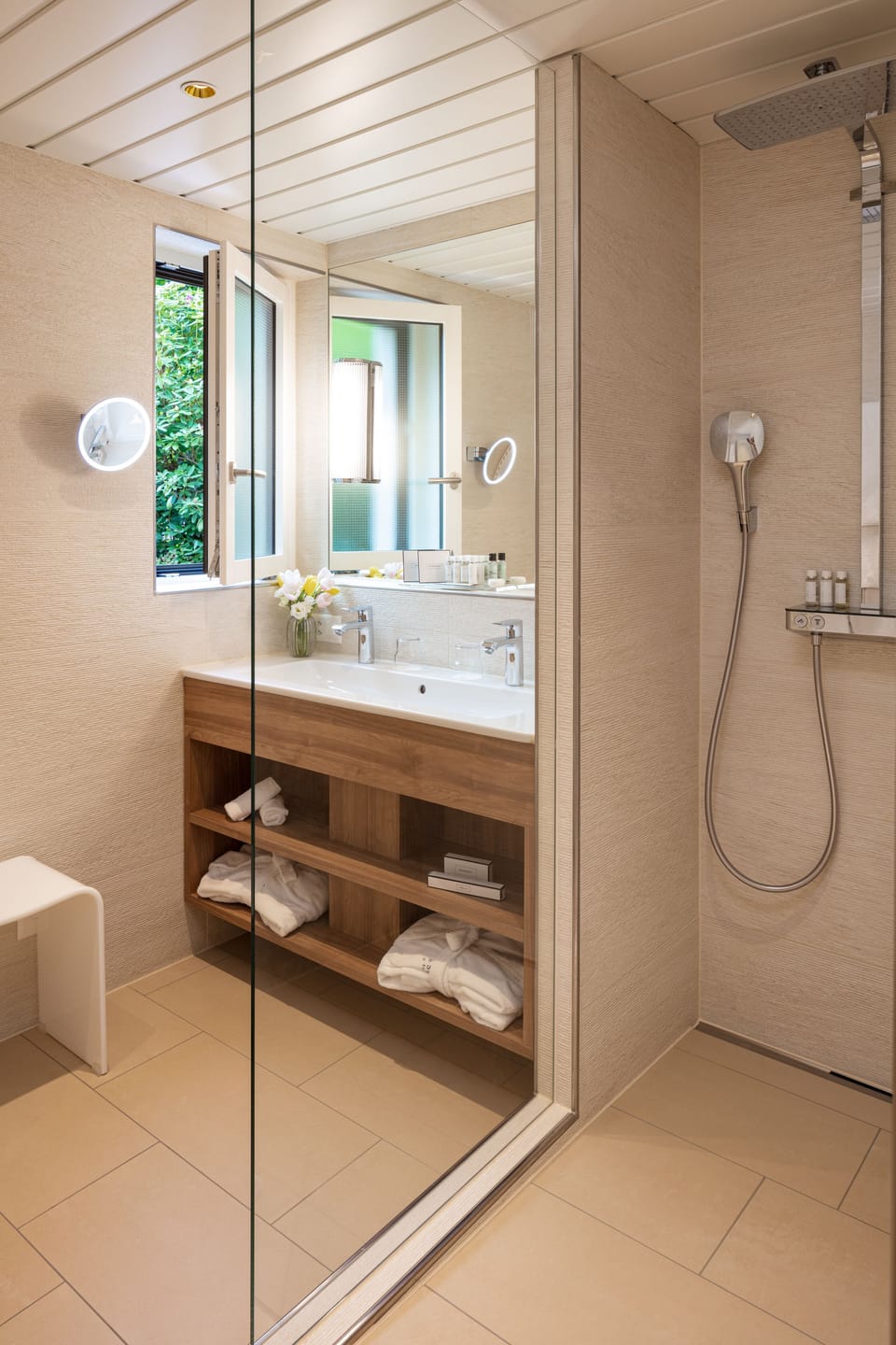 Designer toiletries, hair dryer, bathrobes, slippers