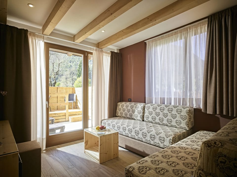 Deluxe Quadruple Room, Mountain View | Down comforters, memory foam beds, in-room safe, individually furnished