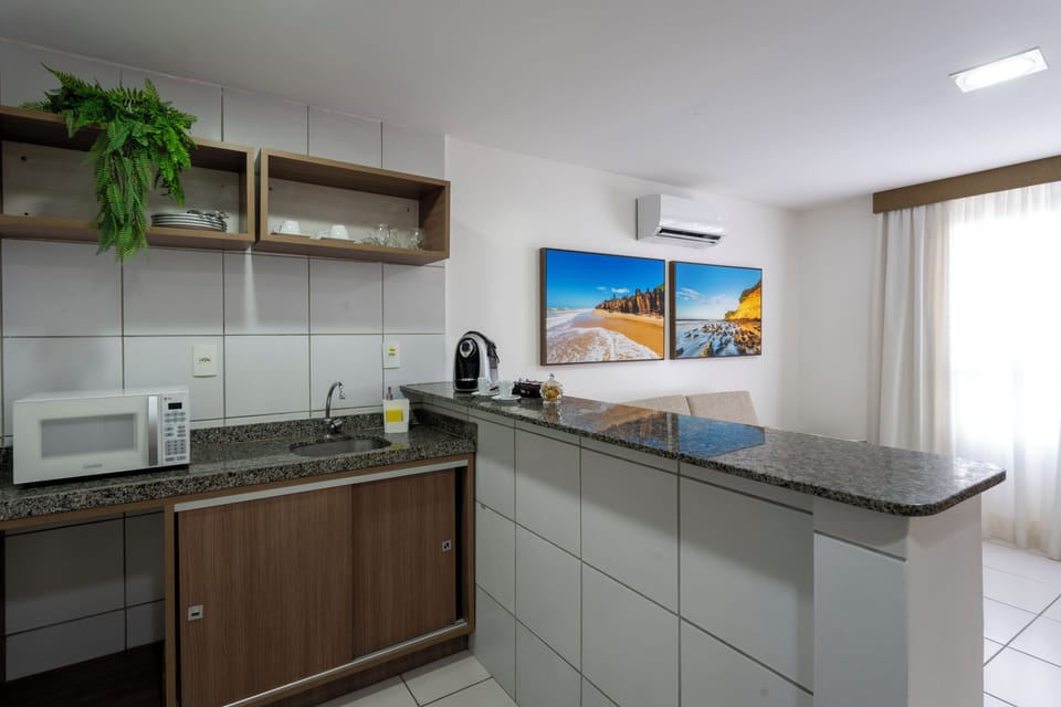 Executive Suite | Minibar, in-room safe, desk, laptop workspace