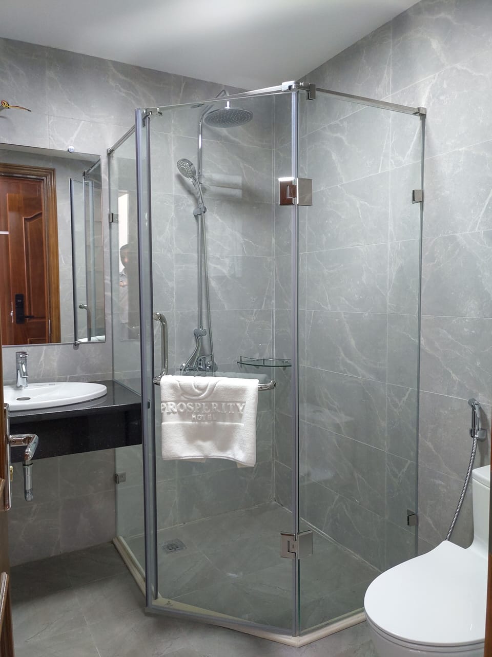 Shower, hydromassage showerhead, designer toiletries, hair dryer