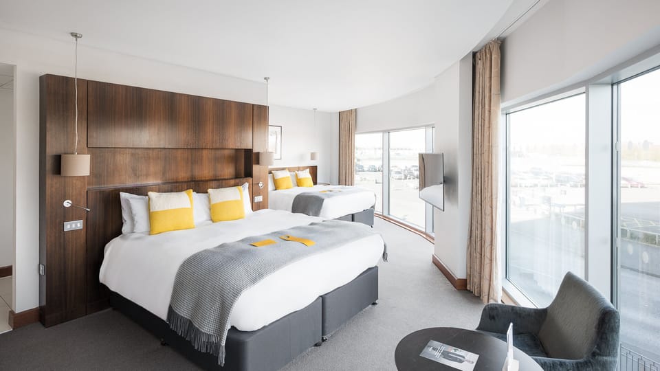 Grand Room, Multiple Beds | In-room safe, desk, iron/ironing board, free WiFi