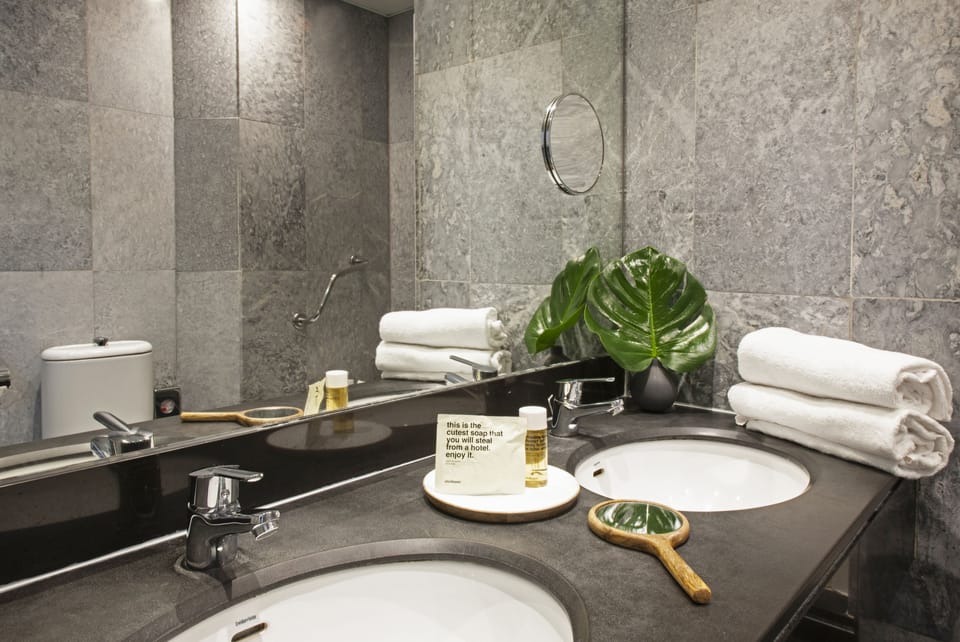 Bathtub, hair dryer, towels
