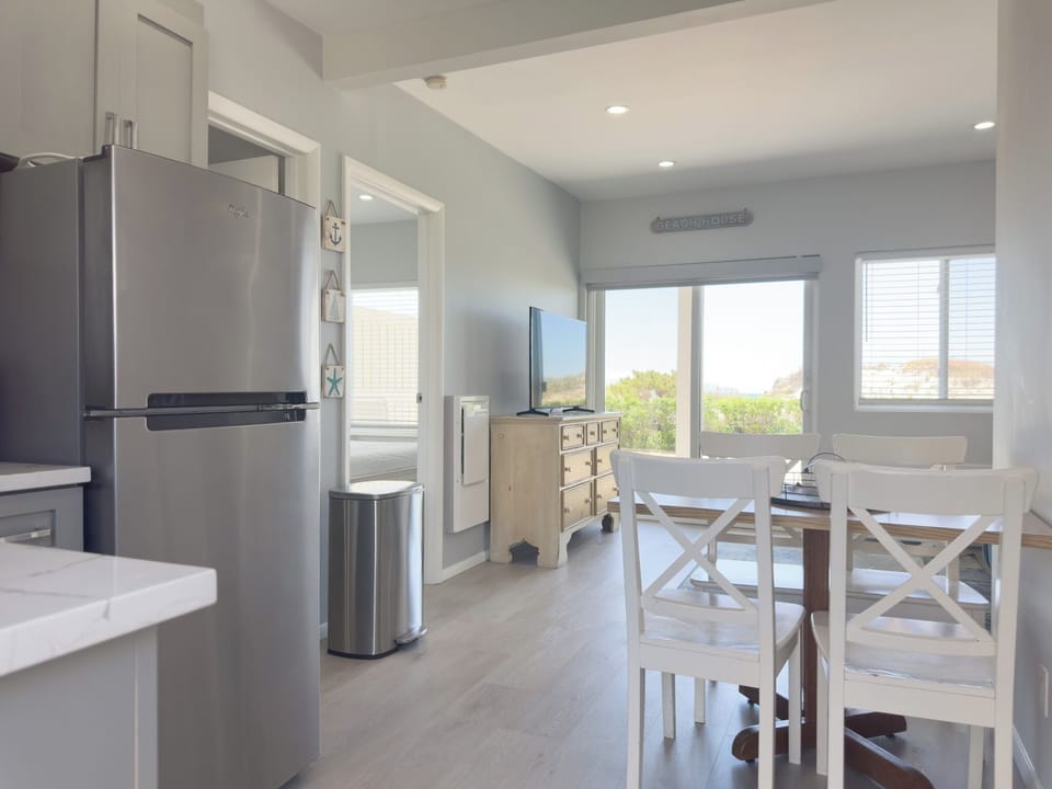 Lower 1.5 Bedroom Oceanfront  | Living area | TV