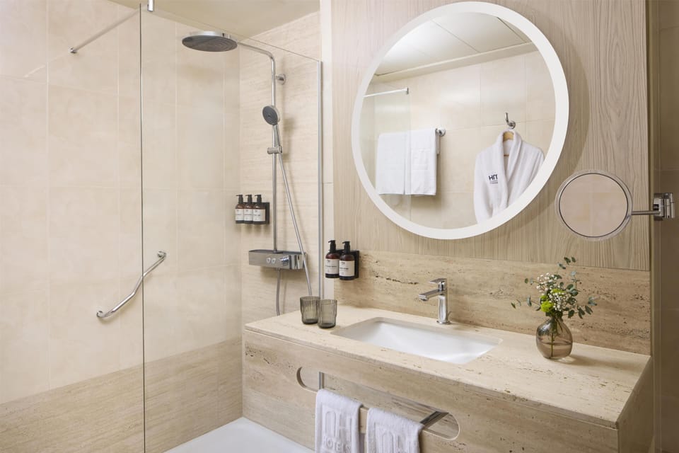 Bathtub, eco-friendly toiletries, hair dryer, bidet