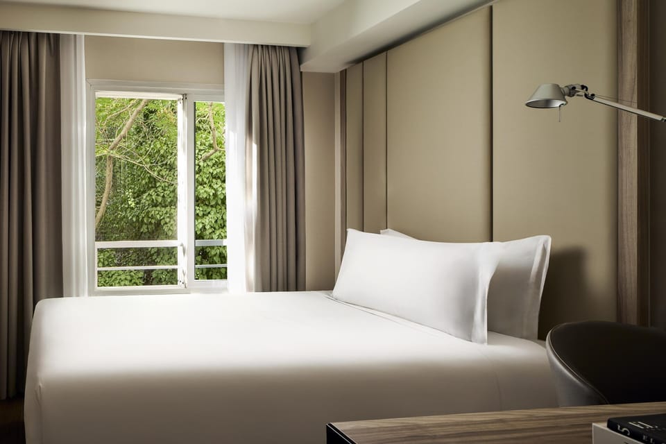 Standard Single Room | Minibar, in-room safe, desk, blackout drapes