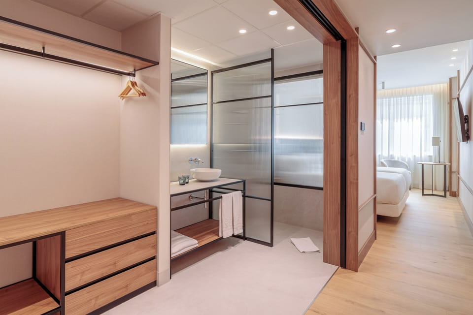 Superior Room | Bathroom | Hair dryer, towels, soap, shampoo