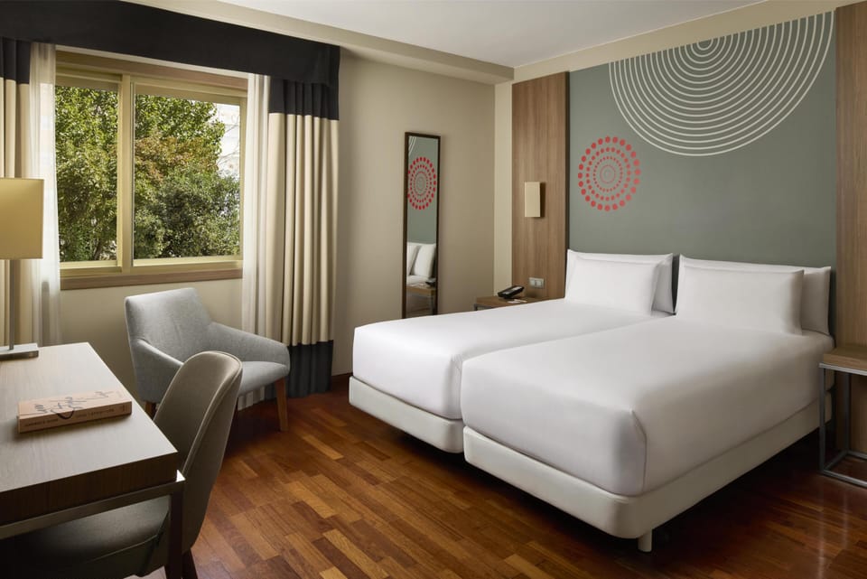 Down comforters, in-room safe, desk, blackout drapes