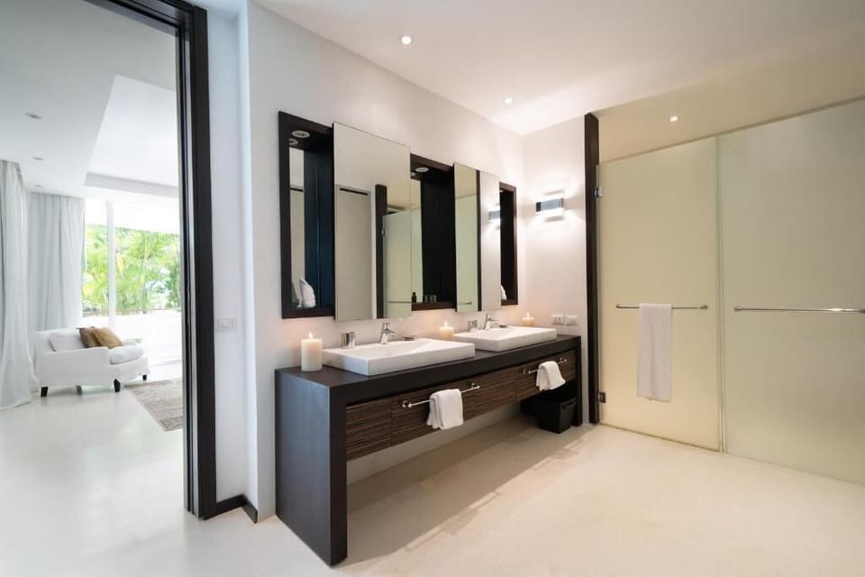 Designer toiletries, bathrobes, slippers, towels