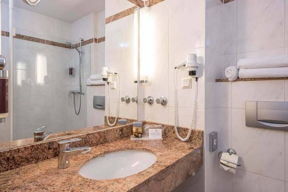 Shower, free toiletries, hair dryer, bathrobes