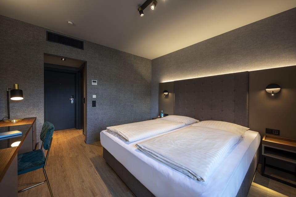 Business Double Room | Premium bedding, desk, laptop workspace, blackout drapes