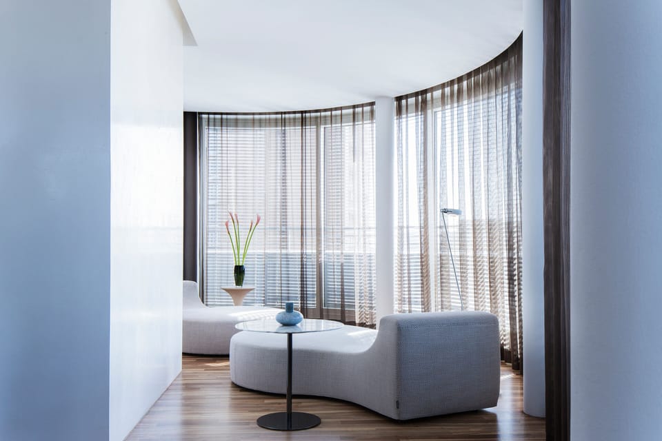 Premium bedding, down comforters, minibar, in-room safe