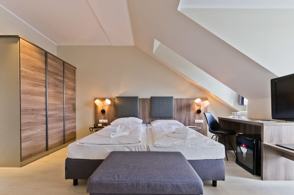 Family Room | Minibar, in-room safe, desk, laptop workspace